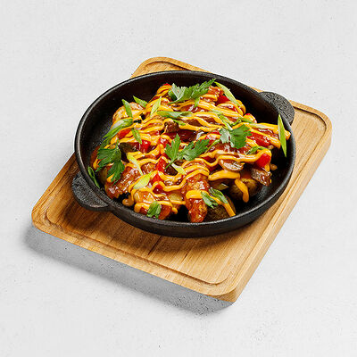 Скоблянка с говядиной и свининой под соусом чеддeр в ПиццаФабрика по цене 710 ₽