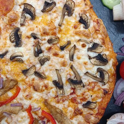 Пицца Четыре сезона в Teramo Pizza по цене 750 ₽