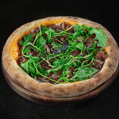 Пицца с ростбифом и вялеными томатами в Интонация по цене 1450 ₽