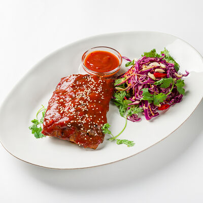 Свиные ребра с соусом барбекю в Сыроварня по цене 1390 ₽