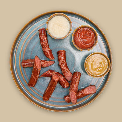 Охотничьи колбаски в Любим сытно по цене 675 ₽