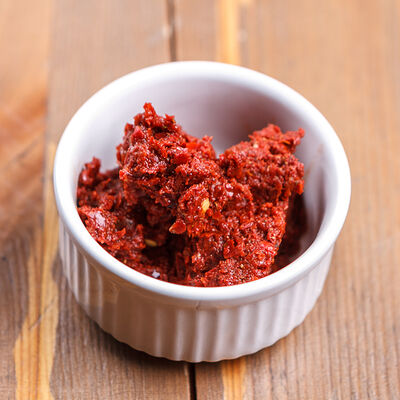 Острая аджика красная в Хачапури по цене 150 ₽