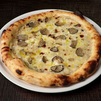 Пицца Трюфель в Dacha restaurant по цене 1190 ₽