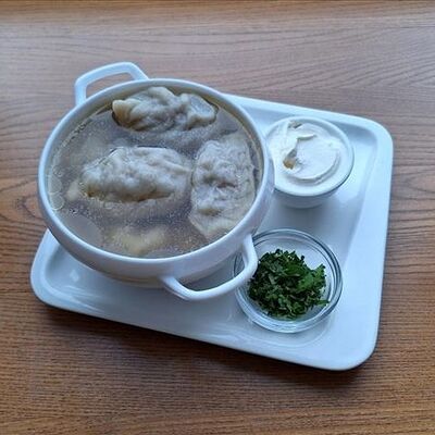Пельмени с бульоном в Соль & Перец по цене 437 ₽