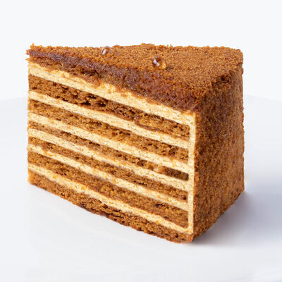 Медовик (порция) в Udcкафе Upside Down Cake по цене 550 ₽