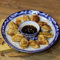 Жареные пельменив Хаочи