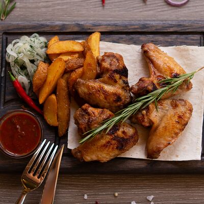 Шашлык из куриных крылышек в Каштан по цене 530 ₽