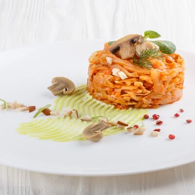 Тушеная капуста с грибами в MaxBakery по цене 210 ₽