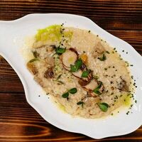 Ризотто с белыми грибами и пармезаном в The River Restaurant