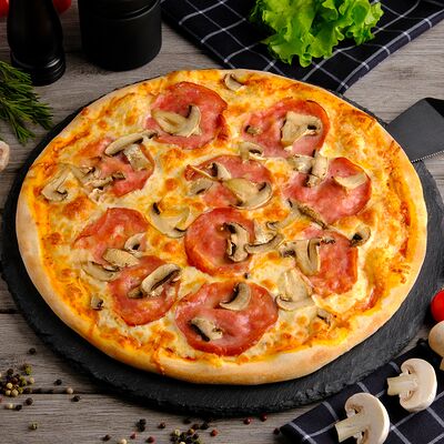 Пицца Ветчина с грибами в Несушка по цене 520 ₽