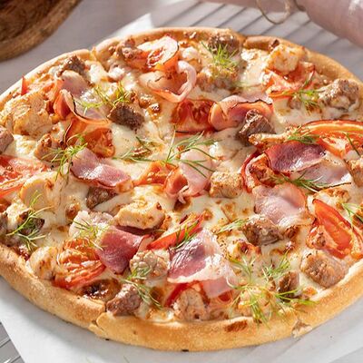 Пицца Мясная в Трата сушечки по цене 948 ₽