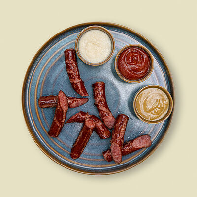 Охотничьи колбаски в Додома по цене 680 ₽