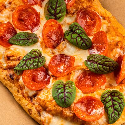 Пицца Пеперони в Омар Хайям по цене 650 ₽