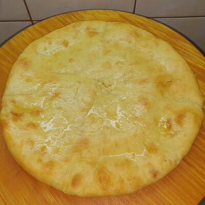 Пирог с картошкой и сыром в Хинкальная по цене 600 ₽