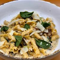Кампанелли с белыми грибами и трюфельным маслом в Гранат