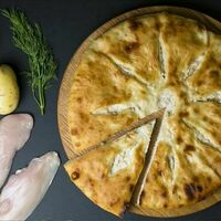 Осетинский пирог с курицей и картофелем в Pizzarion