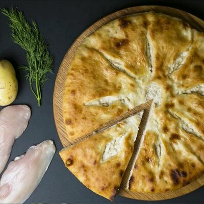 Осетинский пирог с курицей и картофелем в Pizzarion по цене 893 ₽