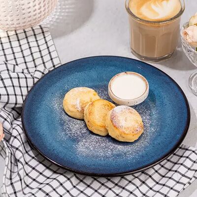 Домашние сырники со сметаной в Vivat Pizza по цене 585 ₽