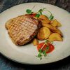 Стейк из свинины, фаршированный сыром и картофелем по-деревенски в Вкус кафе по цене 726