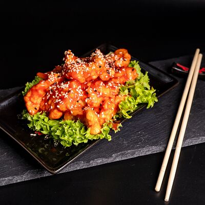 Курица в кисло-сладком соусе в Sushiland по цене 630 ₽