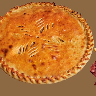 Осетинский пирог с мясом и капустойв Totoro по цене 1299 ₽