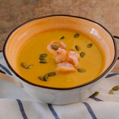 Суп тыквенный с креветкой в Krutli по цене 462 ₽