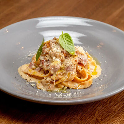 Тальятелле Карбонара в Il Pizzaiolo по цене 710 ₽
