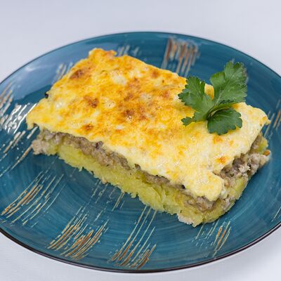 Запеканка картофельная с говядиной в Тарелка по цене 347 ₽