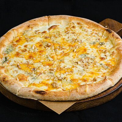 Пицца четыре сыра в Еда Да по цене 514 ₽