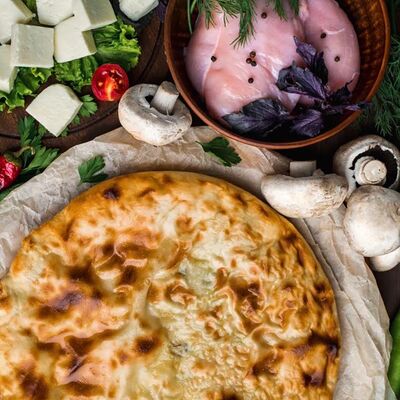 Осетинский пирог Курица-грибы в Осетинские пироги по цене 910 ₽