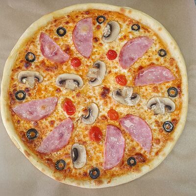 Пицца с ветчиной и грибами в Cold milk burger по цене 513 ₽