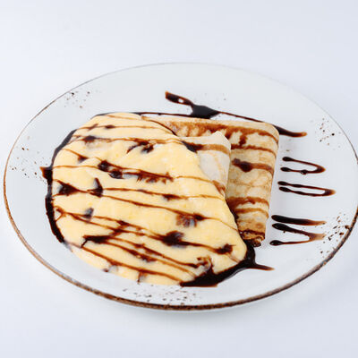 Блины с соусом из игристого в Кофеин по цене 490 ₽