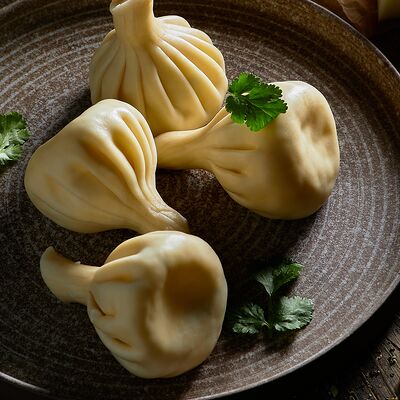 Хинкали с говядиной и свининой в Грузинскоебистро Каха по цене 144 ₽