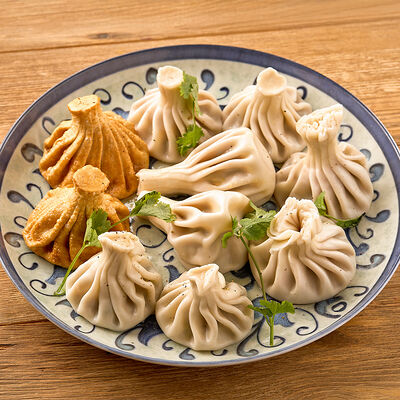 Тарелка 10 хинкали в Шави ломи по цене 1420 ₽