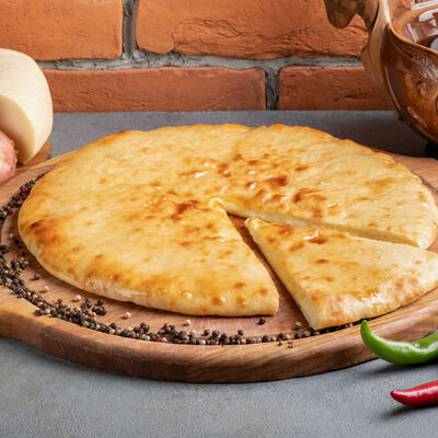 Осетинский пирог с картофелем и сыром в Жар-Птица по цене 370 ₽