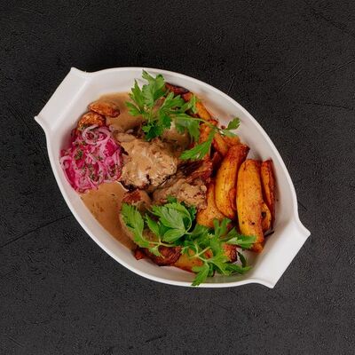 Свинина по-тирольски в Bretzel по цене 500 ₽