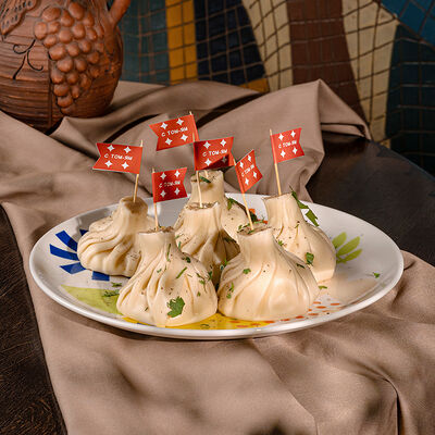 Хинкали том ям с креветкой в Аджикинежаль по цене 200 ₽