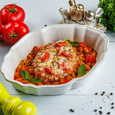 Цыпленок пармиджано с ньоккетти в томатном соусе в Lucia osteria по цене 590 ₽