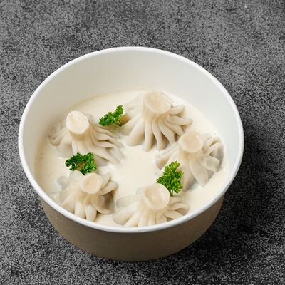 Мини-хинкали с говядиной в сливочном соусе в Баже по цене 410 ₽