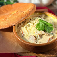 Индейка томленная с вешенками и сыром сулугуни в Сулугуни