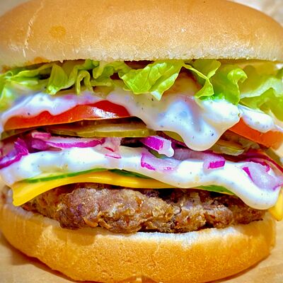 Чесночный бургер в ЗА ОБЕ ЩЁКИ по цене 320 ₽