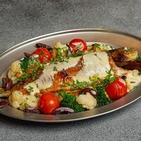 Радужная форель, томаты и оливки каламата в 321 Club by Novikov