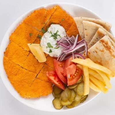 Куриный шницель в Вино и Греки по цене 580 ₽