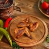 Куриные крылышки на мангале в Achma и Хинкали по цене 580
