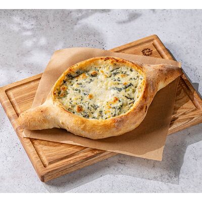 Аджарское хачапури со шпинатом в Tsameti по цене 750 ₽