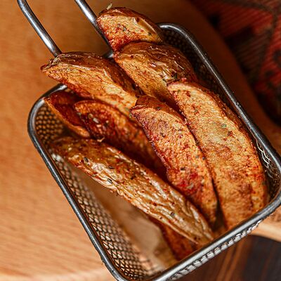 Картофель по-деревенски в Чито-Грито по цене 290 ₽