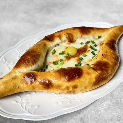 Хачапури с курицей и грибами в MaMa Mia по цене 773 ₽