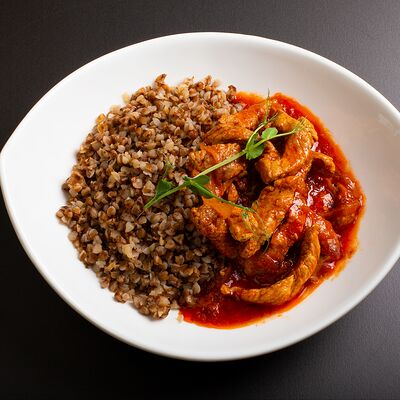 Гречка с поджаркой из свинины в Рябинушка по цене 475 ₽