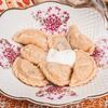 Вареники с картофелем и грибами подаются со сметаной в Монастырский дворик - русская кухня из монастырской трапезы по цене 380