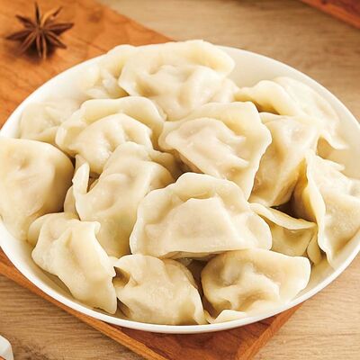 Пельмени с капустой и свининой в Золотая панда по цене 862 ₽